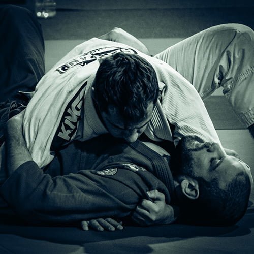 An Americana lock (also known as a keylock) is a move in Jiu Jitsu that involves grabbing an opponent’s arm and hyperextending it at the elbow.